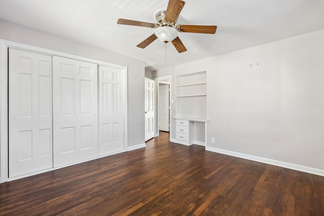 unfurnished bedroom featuring dark hardwood / wood-style flooring, a closet, and ceiling fan