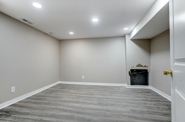 empty room with light hardwood / wood-style flooring