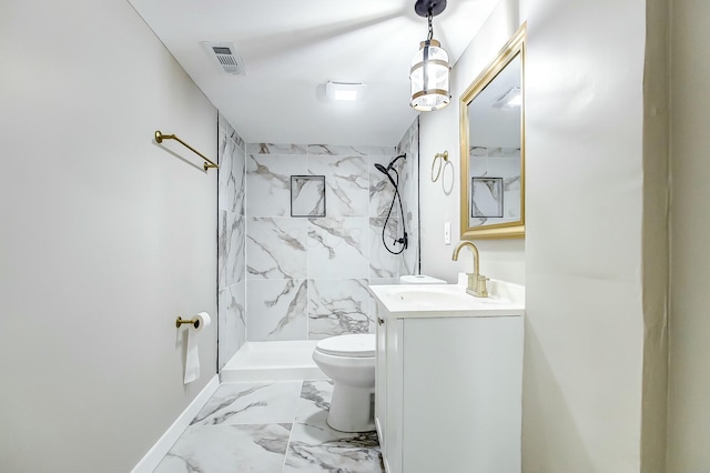 bathroom with vanity, tile walls, toilet, and a shower