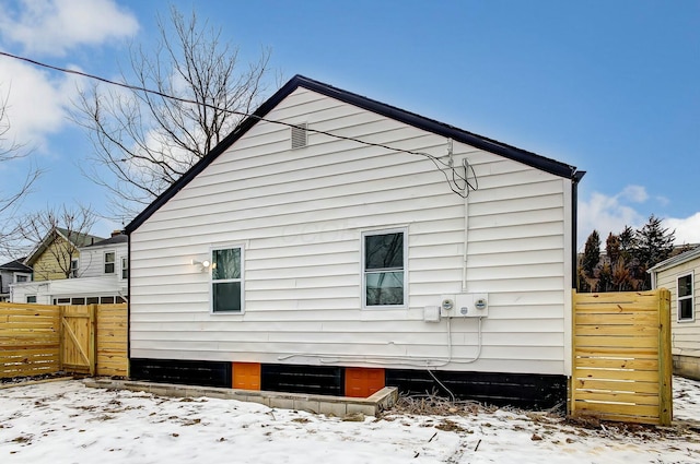 view of snow covered property