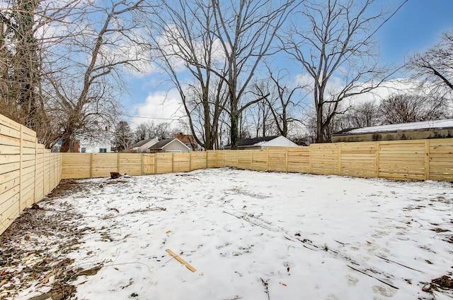 view of snowy yard