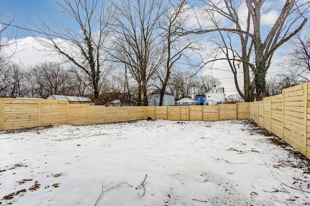 view of snowy yard