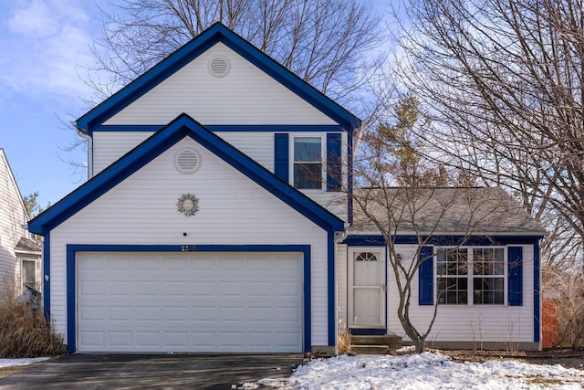 view of front of home with a garage