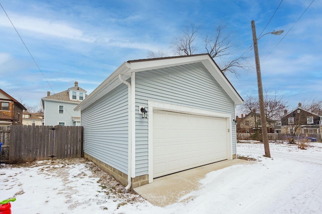 view of snow covered garage