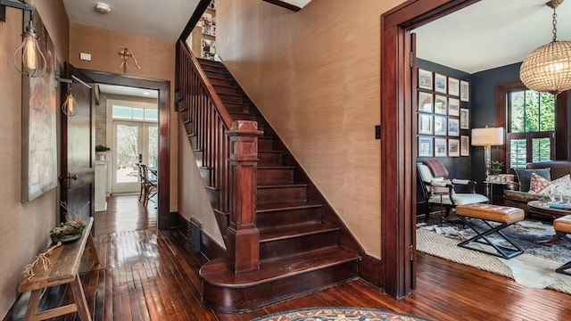 stairway with wood-type flooring