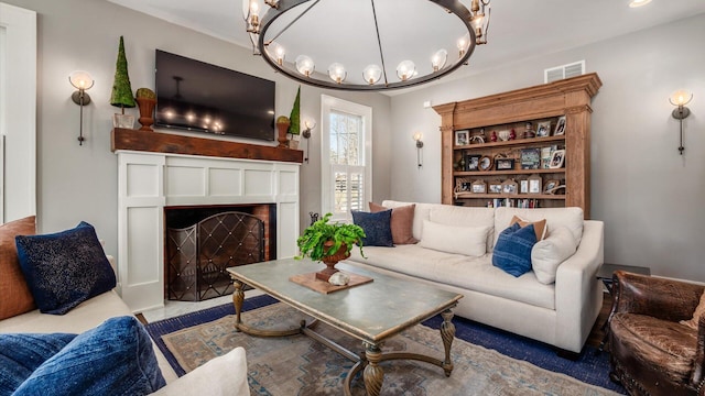 living room with visible vents and a fireplace with flush hearth