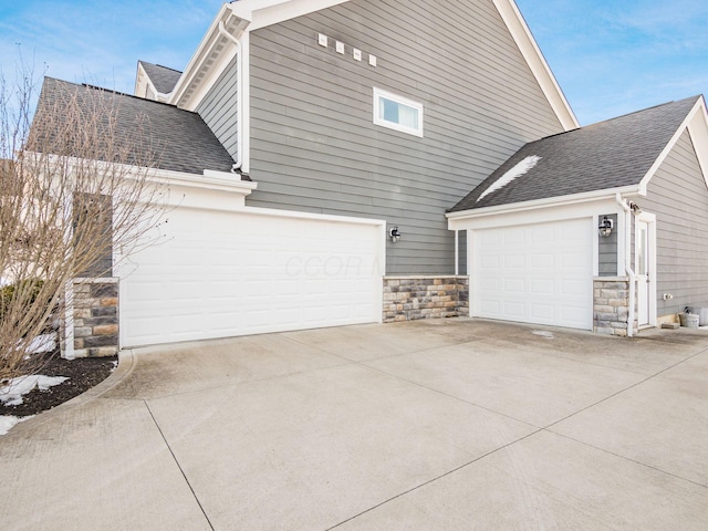 view of home's exterior with a garage