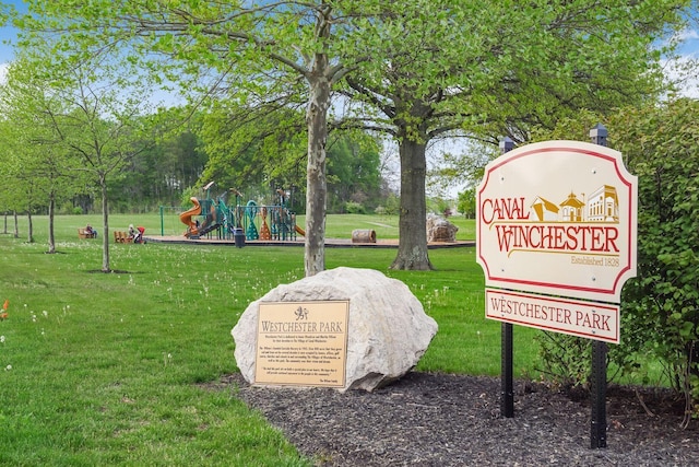 view of community featuring a yard and a playground