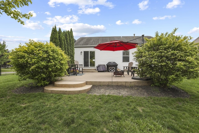 exterior space featuring a grill and a fire pit