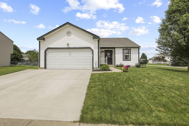 ranch-style house with a garage and a front lawn