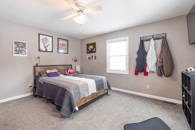 bedroom with carpet floors, baseboards, and a ceiling fan