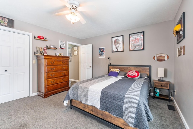 bedroom with baseboards, visible vents, ceiling fan, carpet flooring, and a closet