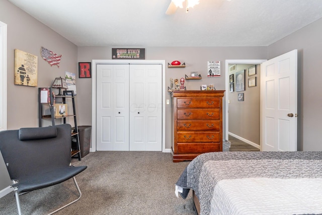 carpeted bedroom with ceiling fan, baseboards, and a closet