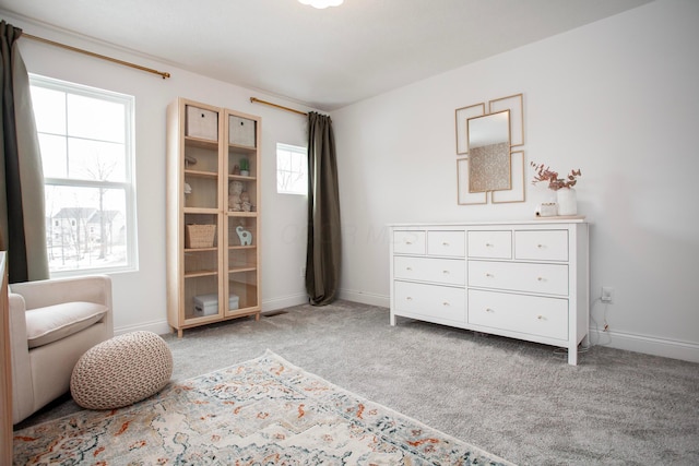 bedroom featuring light colored carpet