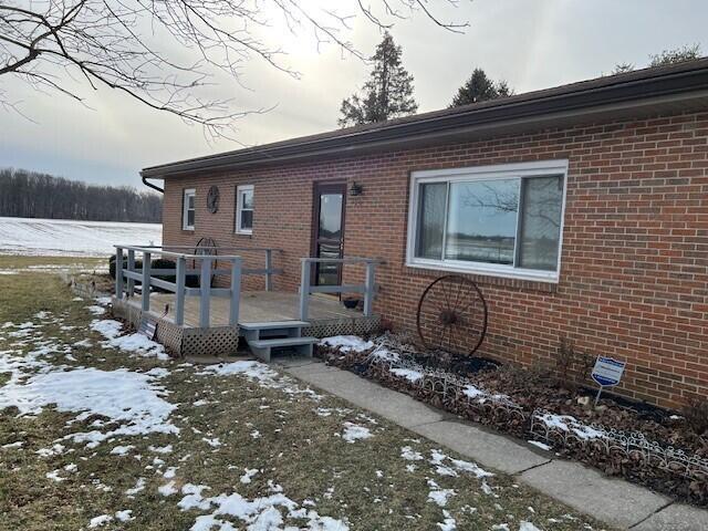 view of front of house featuring a deck