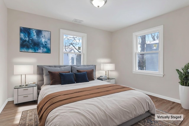 bedroom featuring hardwood / wood-style flooring