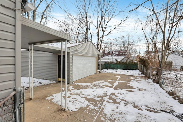 view of snow covered garage