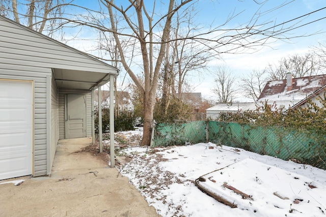 view of yard layered in snow