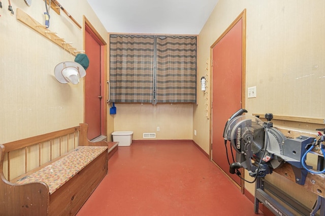 bathroom featuring concrete flooring