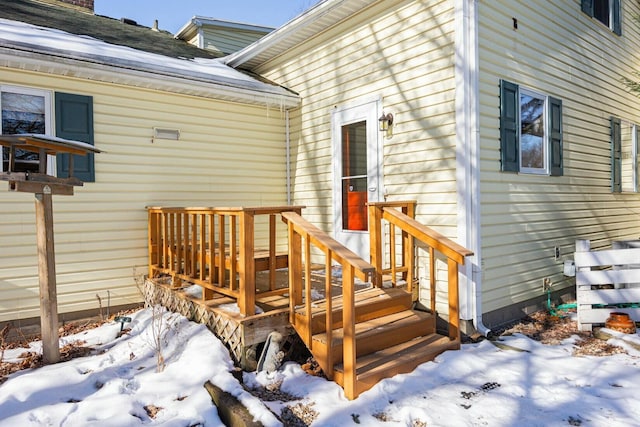 view of snow covered deck