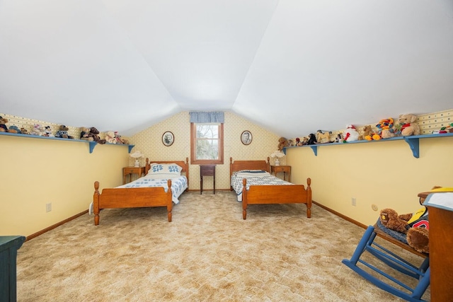 bedroom featuring lofted ceiling and light carpet