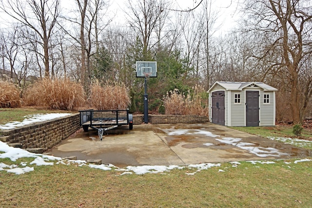 view of patio / terrace featuring a storage unit