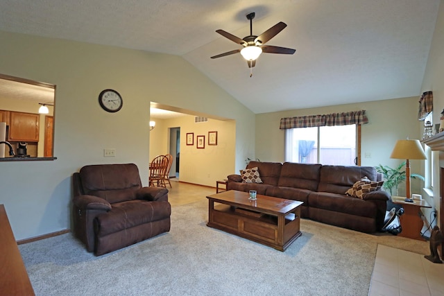 living room featuring lofted ceiling and ceiling fan