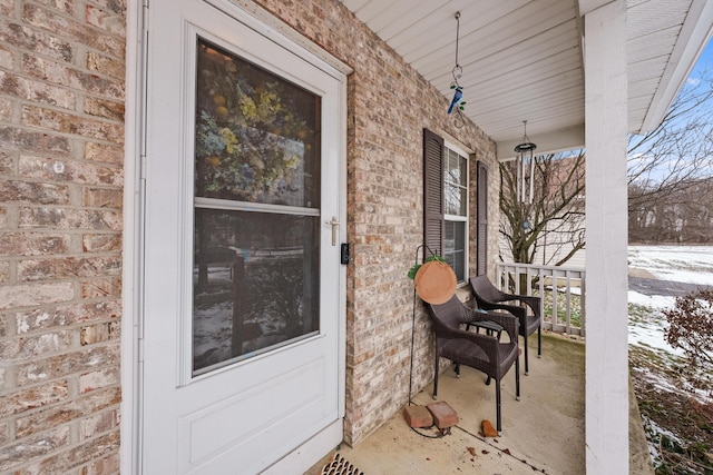 view of snow covered patio