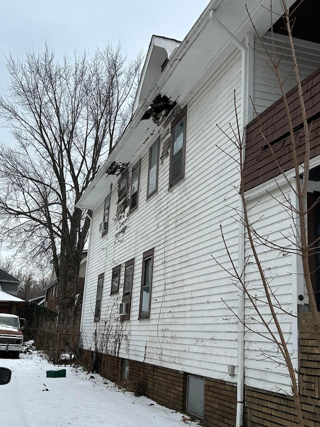 view of snow covered property