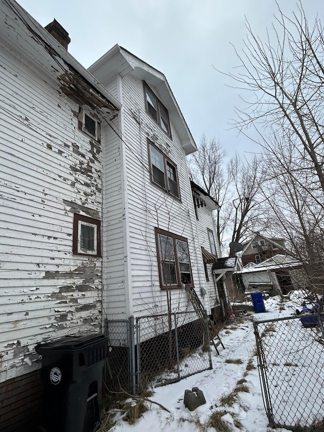 view of snow covered property