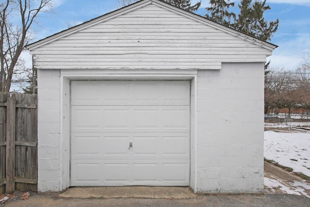 view of snow covered garage