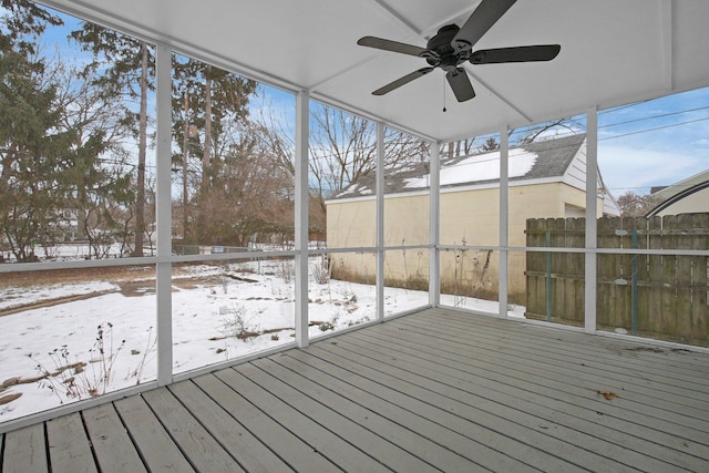 exterior space featuring ceiling fan and a healthy amount of sunlight