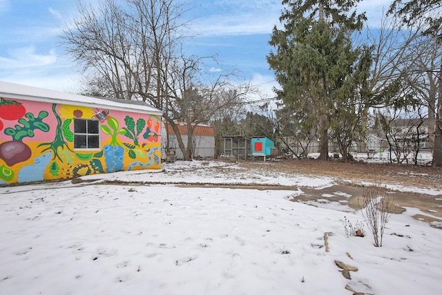 view of yard covered in snow