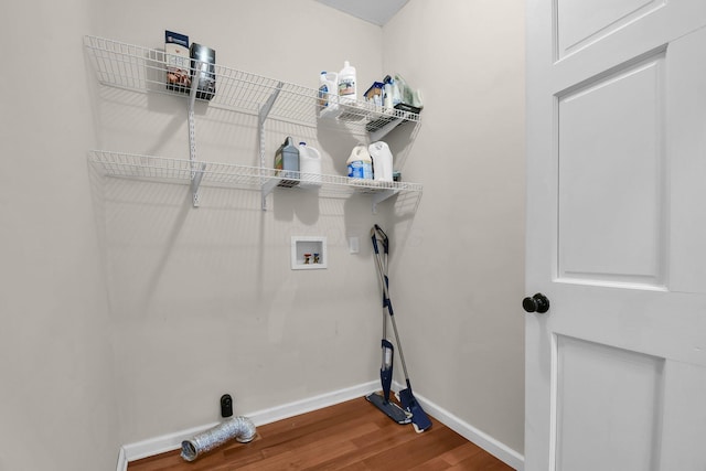 laundry area featuring hookup for a washing machine and wood-type flooring