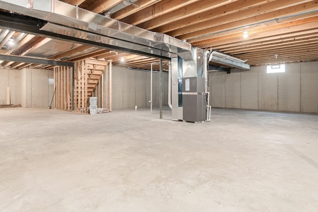 basement featuring heating unit