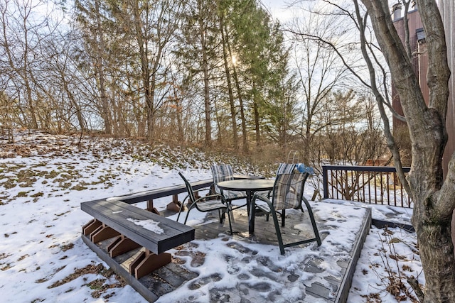 view of snow covered deck