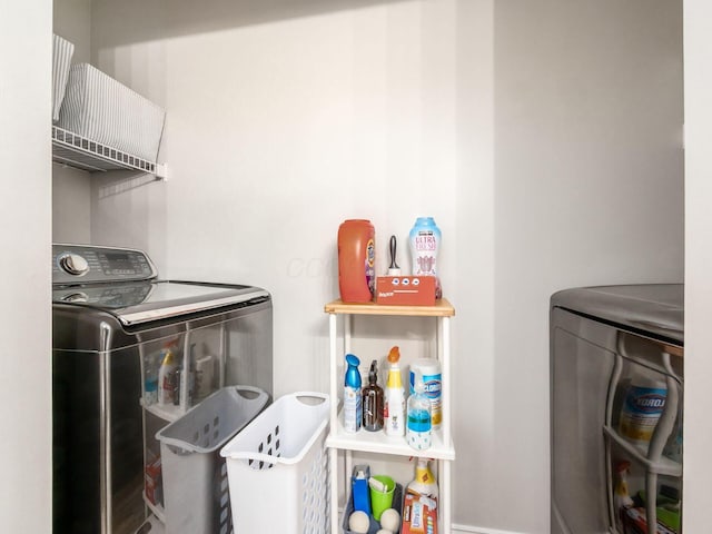 laundry room featuring washer and clothes dryer