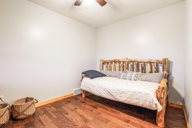 bedroom featuring hardwood / wood-style flooring and ceiling fan