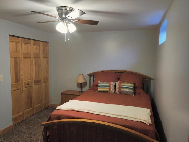 carpeted bedroom featuring ceiling fan and a closet