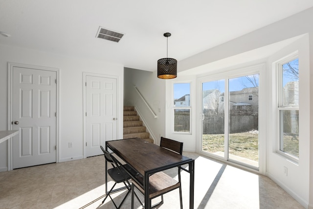 dining area featuring a healthy amount of sunlight