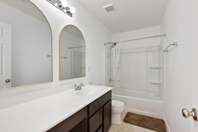 full bathroom featuring shower / bath combo, vanity, and toilet