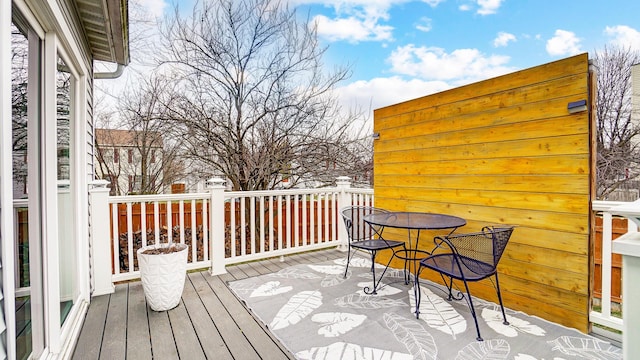 view of snow covered deck