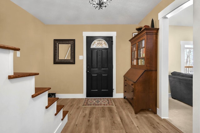 entryway with light wood-type flooring