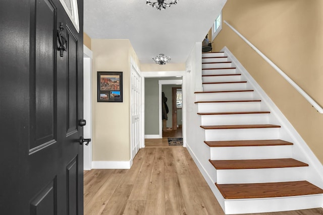 foyer entrance featuring light hardwood / wood-style floors