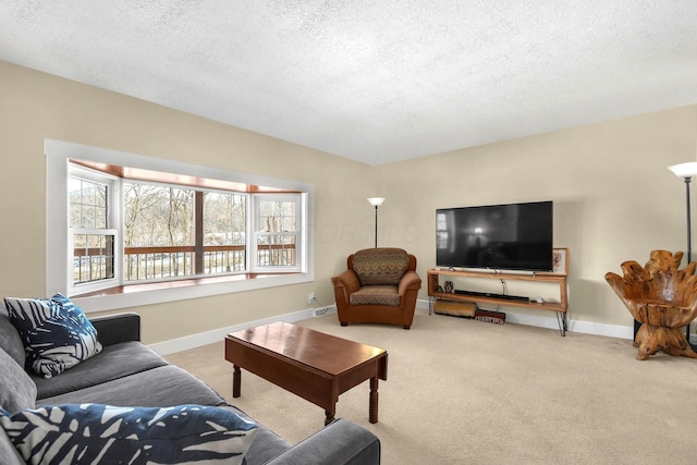 living room with light carpet and a textured ceiling