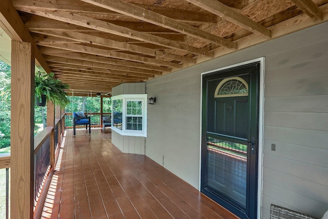 entrance to property featuring a porch