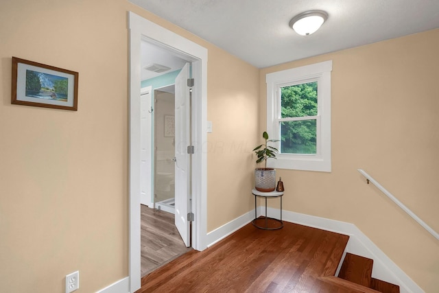 corridor featuring hardwood / wood-style flooring