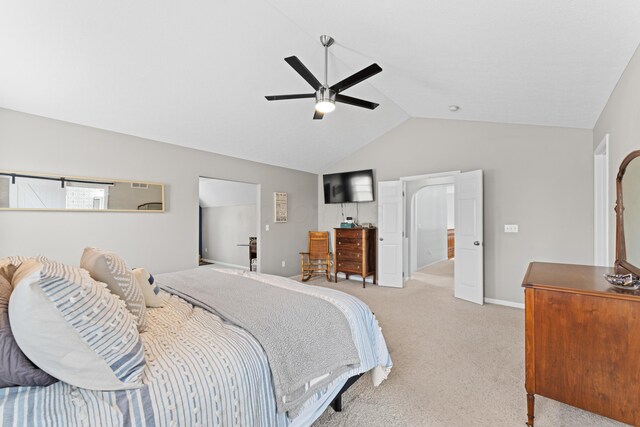 bedroom with high vaulted ceiling, light carpet, a ceiling fan, and baseboards