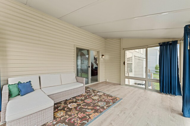 sunroom / solarium with an outdoor living space