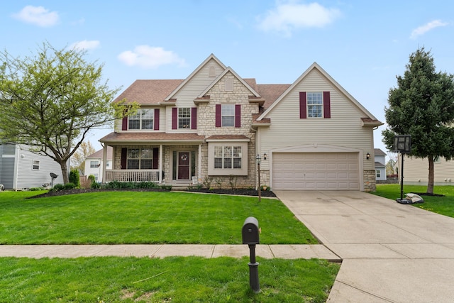 craftsman inspired home with concrete driveway, a front lawn, stone siding, covered porch, and a garage